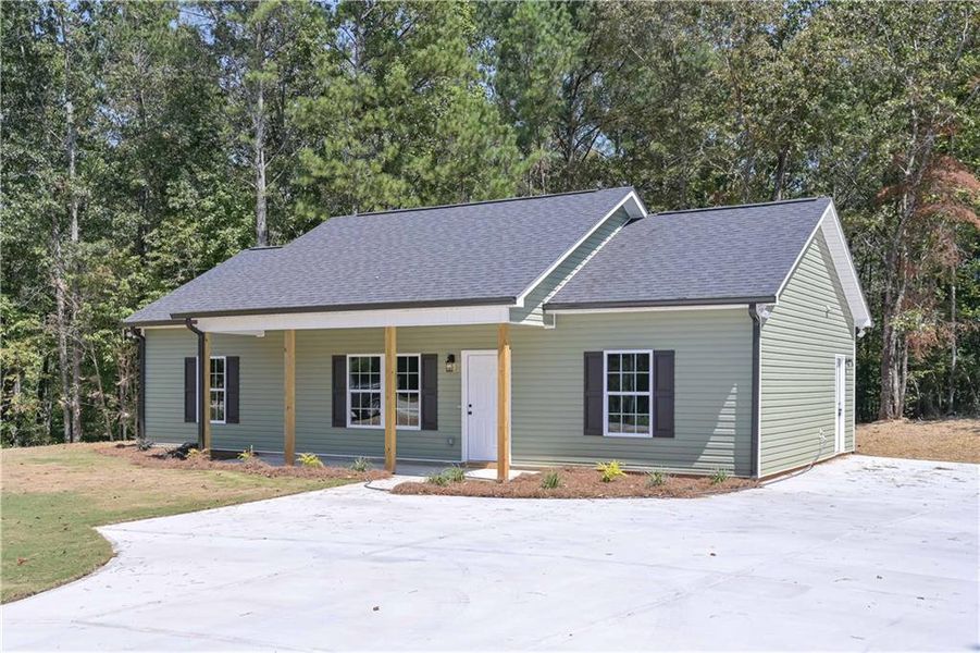 Front exterior of a new home in , Temple, GA, highlighting curb appeal (Image 16).