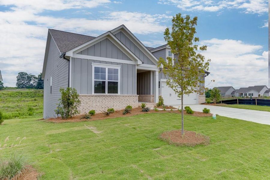 Front exterior of a new home in , Jefferson, GA, highlighting curb appeal (Image 24).