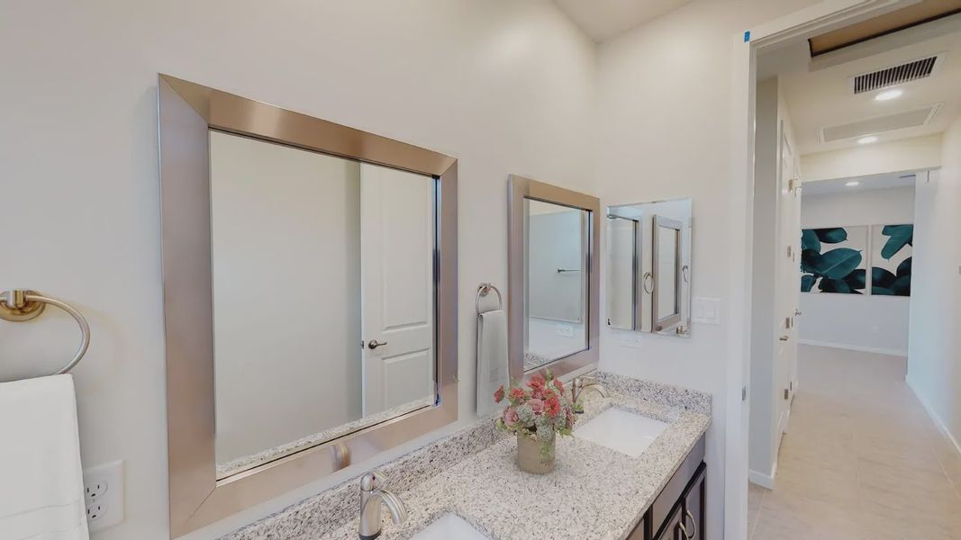 Representative furnished interior of a home built from the 201 by Elliott Homes in Las Barrancas, Yuma (Image 25).