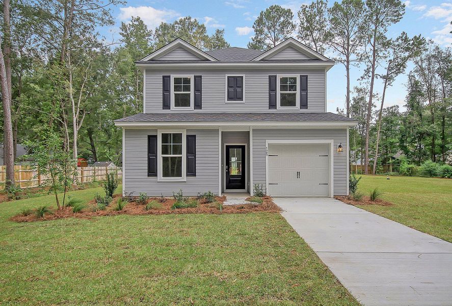 Front exterior of a new home in Founder's Park, Lincolnville, SC, highlighting curb appeal (Image 21).