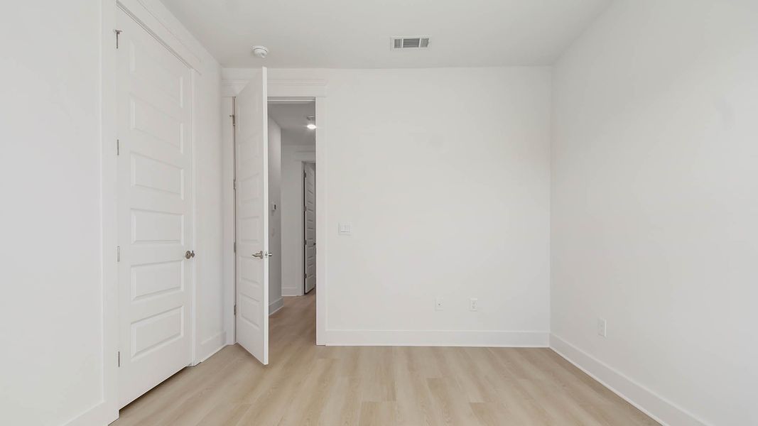 Representative unfurnished interior of a home built from the Trenton by D.R. Horton in Parkside, Santa Rosa Beach (Image 35).