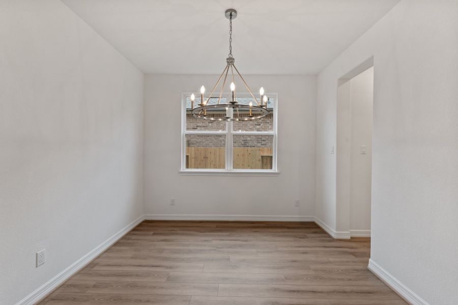 Formal Dining room. Note: Sample product photo - actual exterior and interior selections may vary by homesite