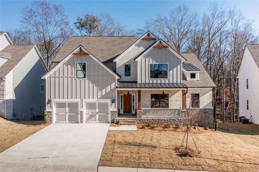 Front exterior of a new home in , Douglasville, GA, highlighting curb appeal (Image 1).
