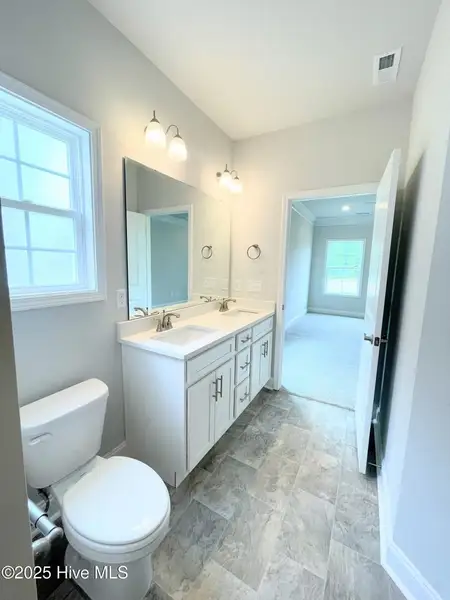 Furnished interior view inside a new home in Athens Acres, New Bern (Image 4). Furnished interior view inside a new home in Athens Acres, New Bern (Image 4).