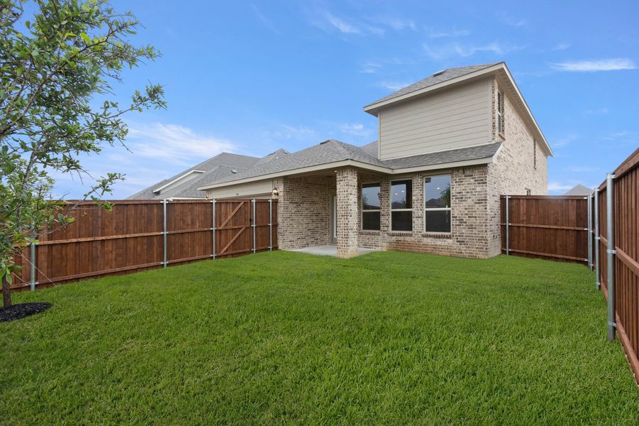 Front exterior of a new home in Redden Farms, Midlothian, TX, highlighting curb appeal (Image 28). Front exterior of a new home in Redden Farms, Midlothian, TX, highlighting curb appeal (Image 28).