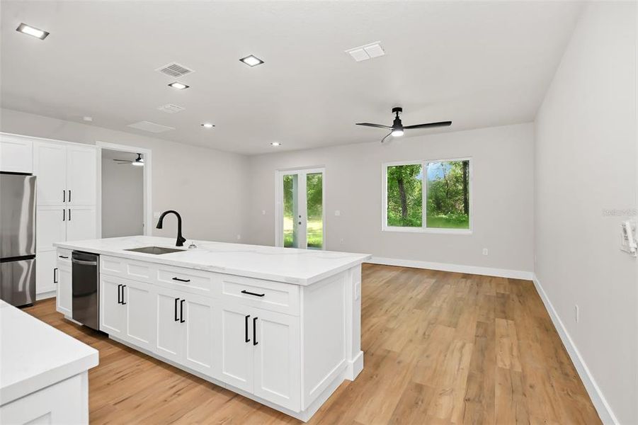 Furnished interior view inside a new home in , Dunnellon (Image 7).