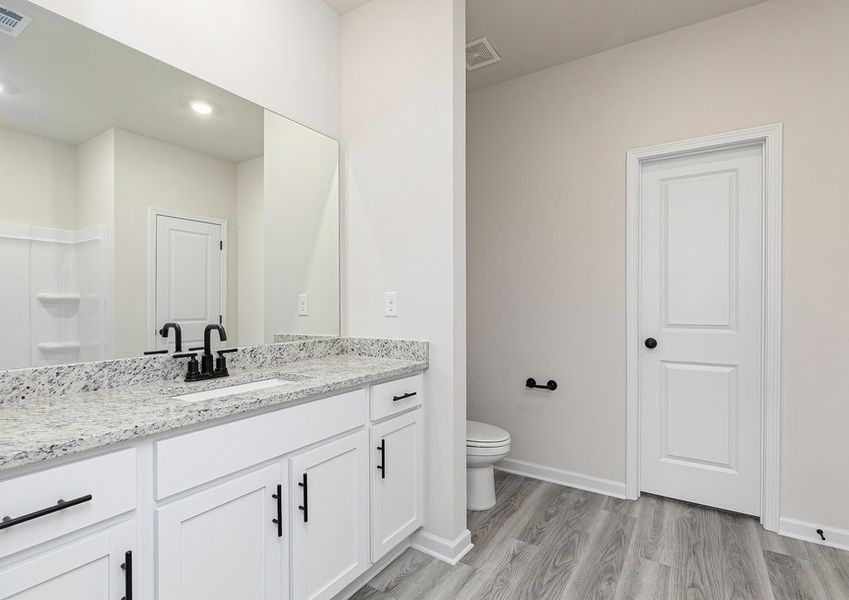 Get ready for your day in the master bathroom