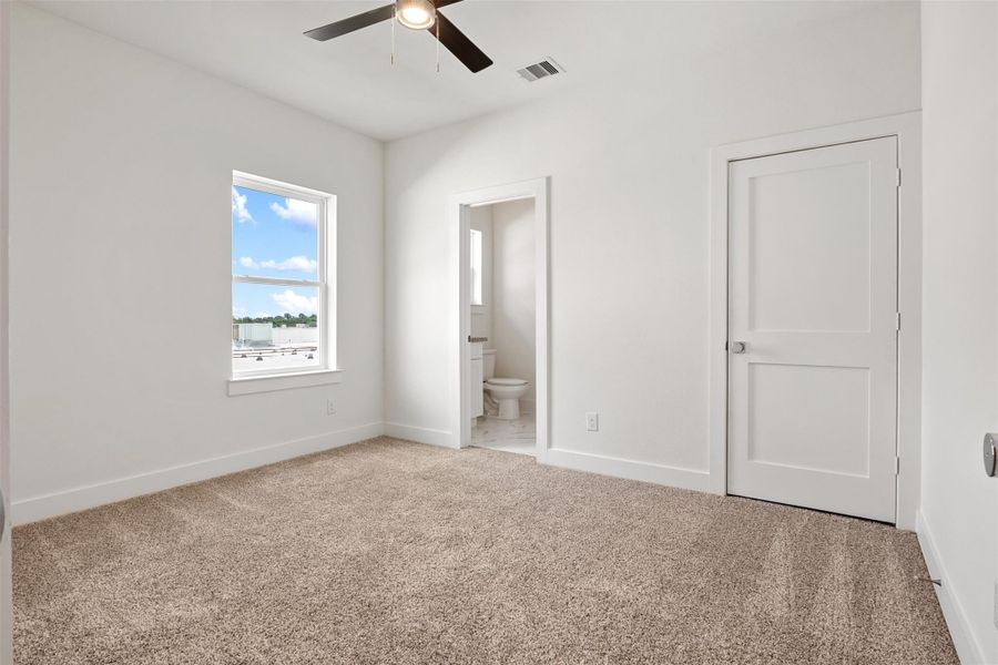 The secondary bedroom offers plenty of space, cozy carpeting, and its own private bathroom. The secondary bedroom offers plenty of space, cozy carpeting, and its own private bathroom.