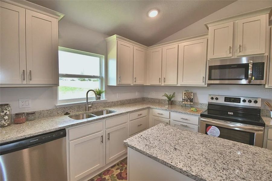 Furnished interior view inside a new home in Magnolia Park, Haines City (Image 16).