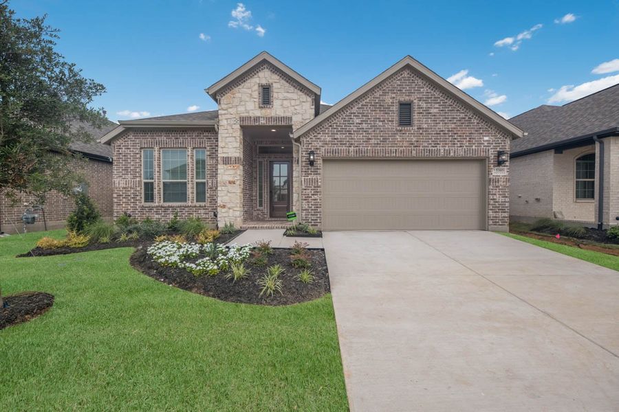 Front exterior of a new home in Las Lomas, Forney, TX, highlighting curb appeal (Image 20).