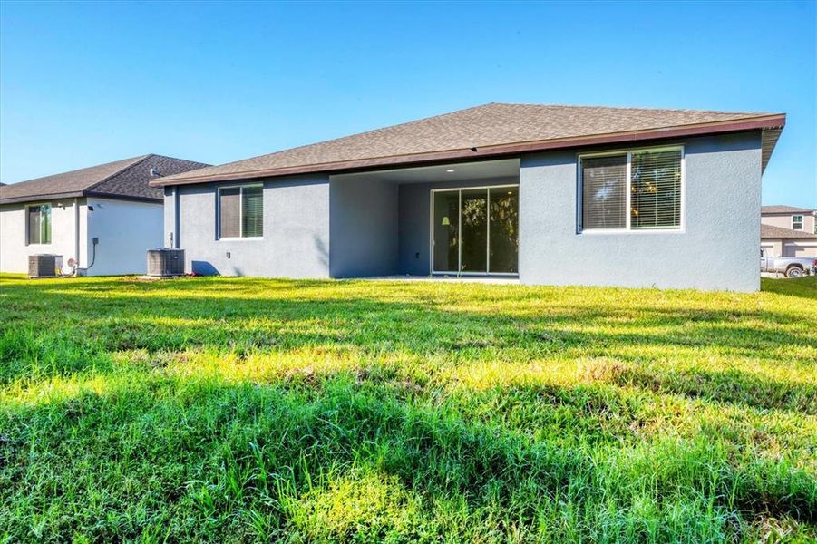 Front exterior of a new home in , Parrish, FL, highlighting curb appeal (Image 2).