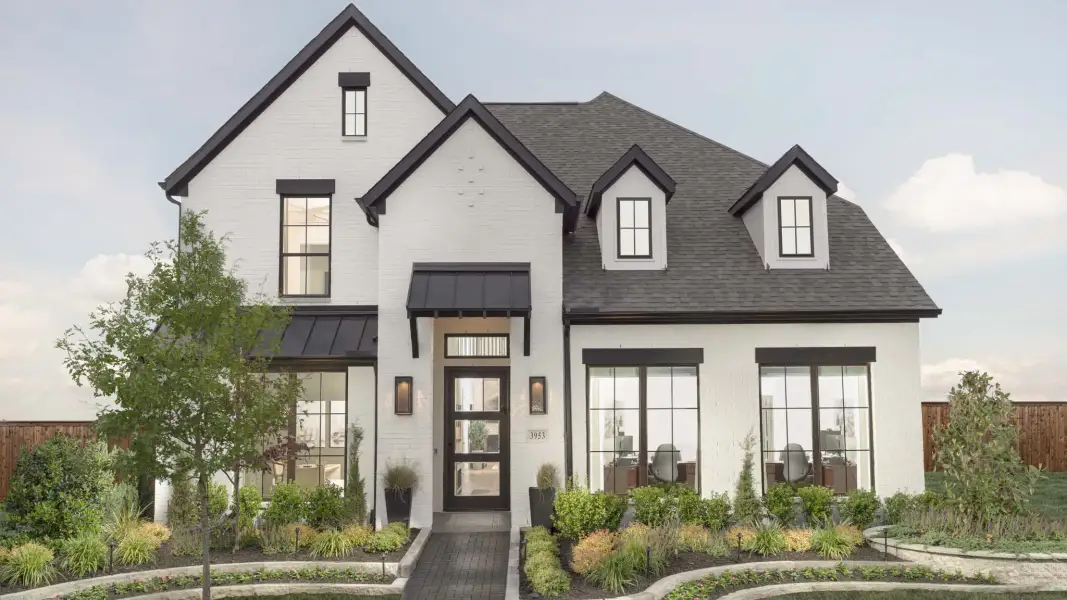Front exterior of a new home in Eliana, McKinney, TX, highlighting curb appeal (Image 2). Front exterior of a new home in Eliana, McKinney, TX, highlighting curb appeal (Image 2).