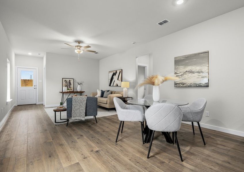 The living room sits right off the dining room. The living room sits right off the dining room.