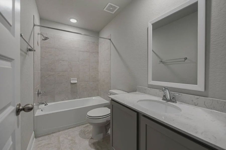 Representative furnished interior of a home built from the Brandy by Chesmar Homes in Buffalo Crossing, Cibolo (Image 27).