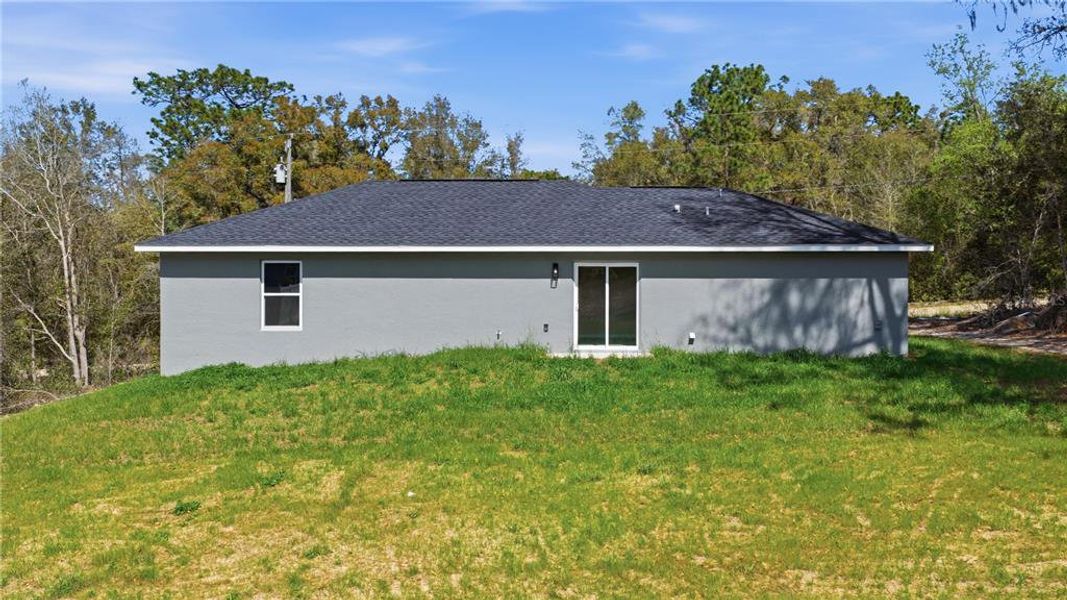 Exterior details and patio area of a home in , Ocala (Image 14).