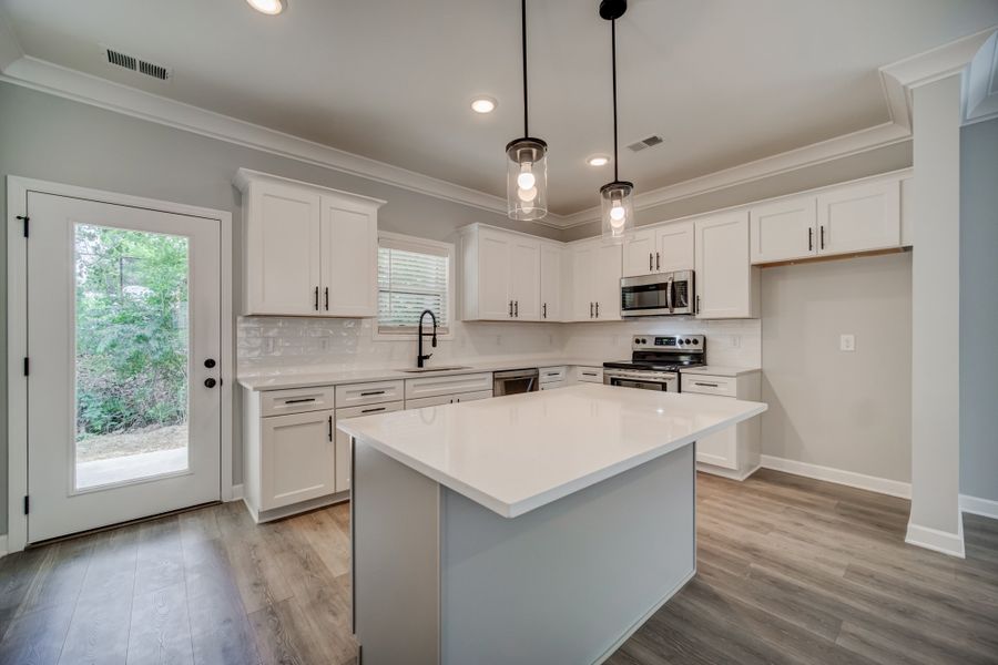 Representative furnished interior of a home built from the Draper by Parkside Builders in The Woods, Gallatin (Image 5).