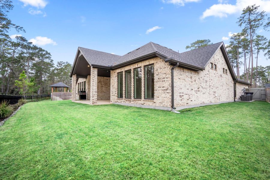 Exterior details and patio area of a home in Audubon, Magnolia (Image 20).