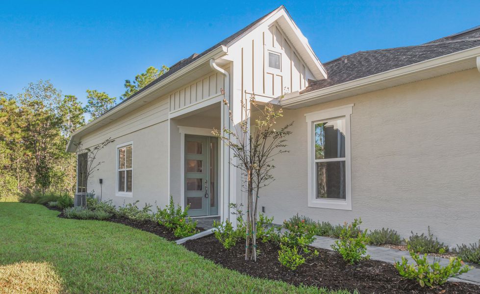Exterior details and patio area of a home in Woodhaven, Port Orange (Image 3). Exterior details and patio area of a home in Woodhaven, Port Orange (Image 3).
