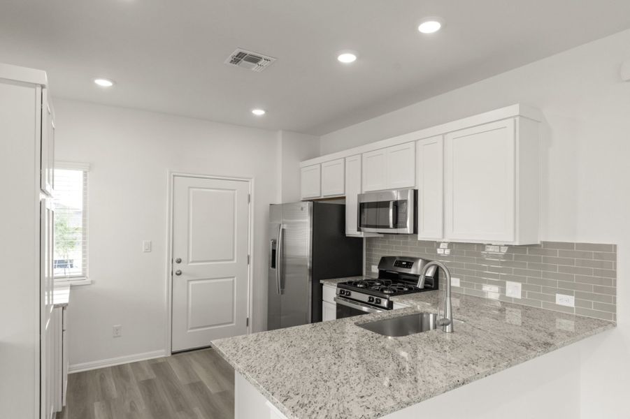 Representative furnished interior of a home built from the Frisco by Pacesetter Homes in Crosswinds, Kyle (Image 7).