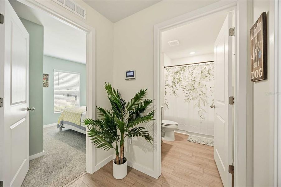 Furnished interior view inside a new home in Central Parc, North Port (Image 30).