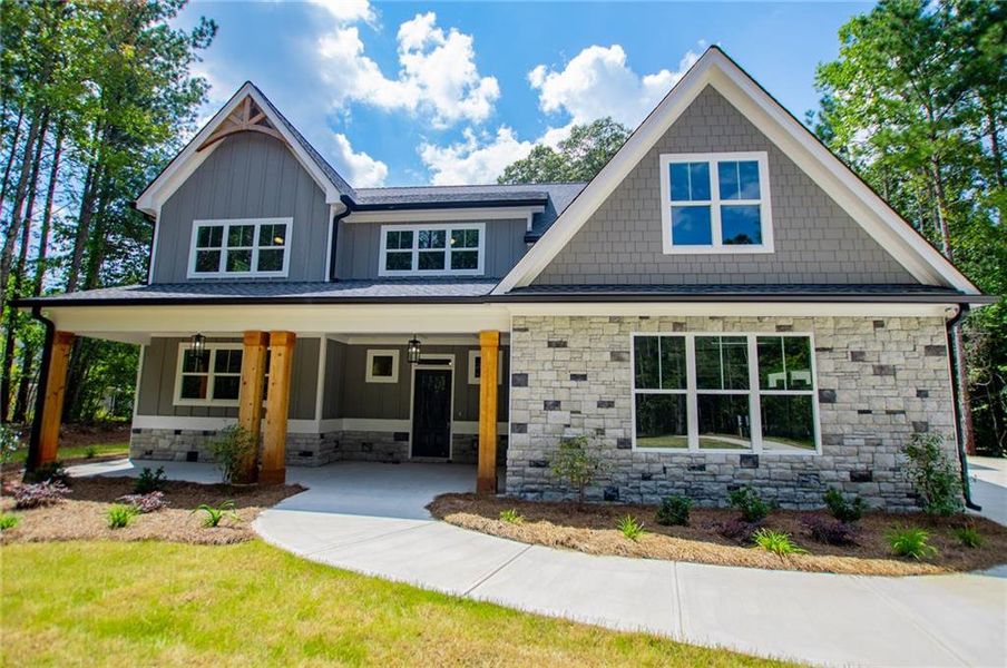 Front exterior of a new home in , Douglasville, GA, highlighting curb appeal (Image 2).