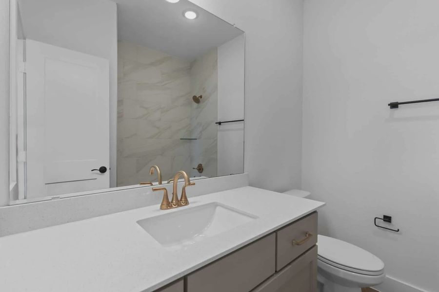 Representative furnished interior of a home built from the St Andrews by Chesmar Homes in Riceland Alley Loads, Mont Belvieu (Image 11).