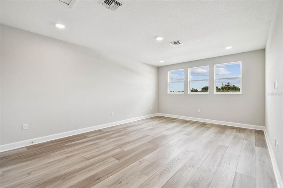 Spacious, unfurnished interior of a new home in Solace at Corner Lake, Orlando (Image 63).