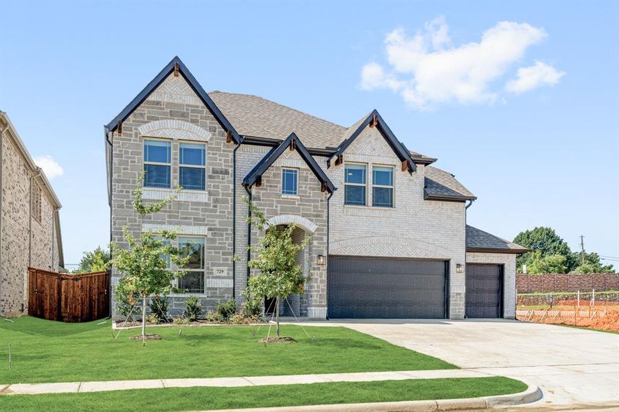 Front exterior of a new home in Mockingbird Hills 60-65, Joshua, TX, highlighting curb appeal (Image 25).