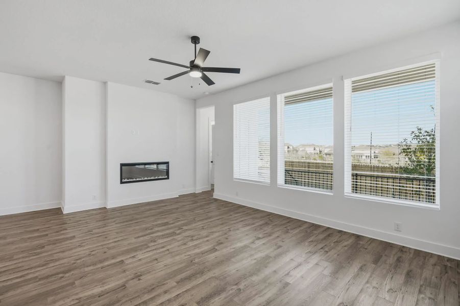 Representative unfurnished interior of a home built from the Talos by Chesmar Homes in Prominence Urban, San Antonio (Image 13).