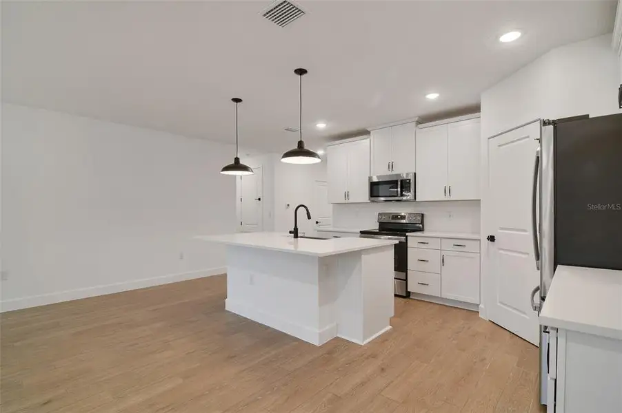 Furnished interior view inside a new home in Aspire at Citrus Springs, Citrus Springs (Image 5).