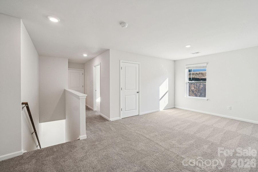 Spacious, unfurnished interior of a new home in Rydele Heights, Asheville (Image 30).