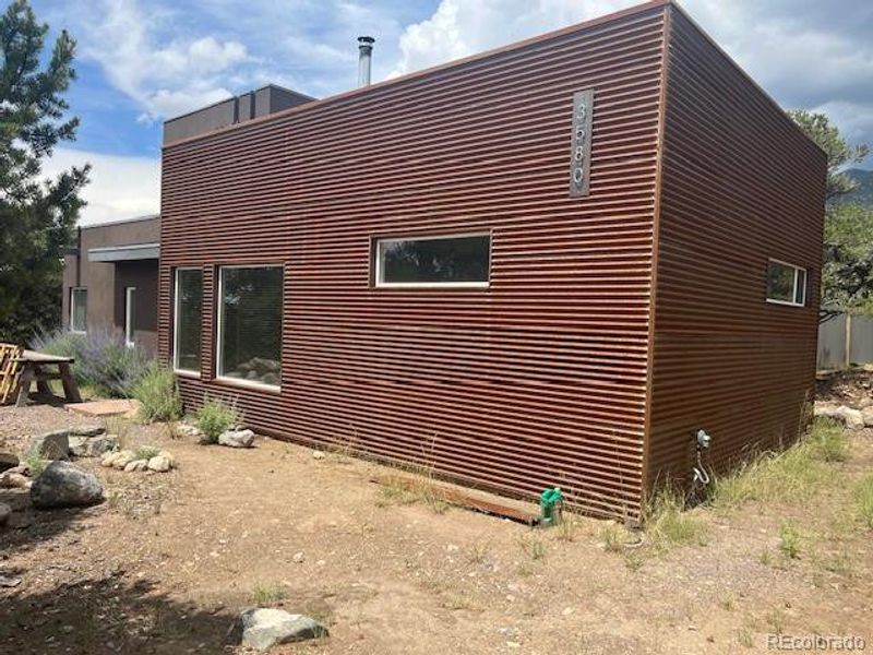 Exterior details and patio area of a home in , Crestone (Image 3). Exterior details and patio area of a home in , Crestone (Image 3).