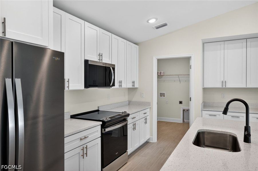Furnished interior view inside a new home in Cape Coral, Cape Coral (Image 8).
