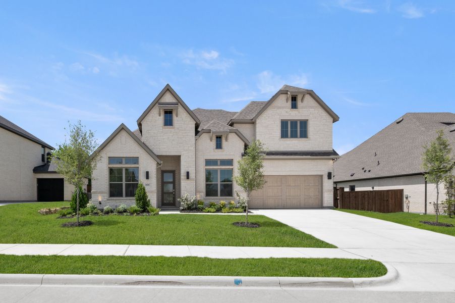 Front exterior of a new home in Redden Farms, Midlothian, TX, highlighting curb appeal (Image 1). Front exterior of a new home in Redden Farms, Midlothian, TX, highlighting curb appeal (Image 1).