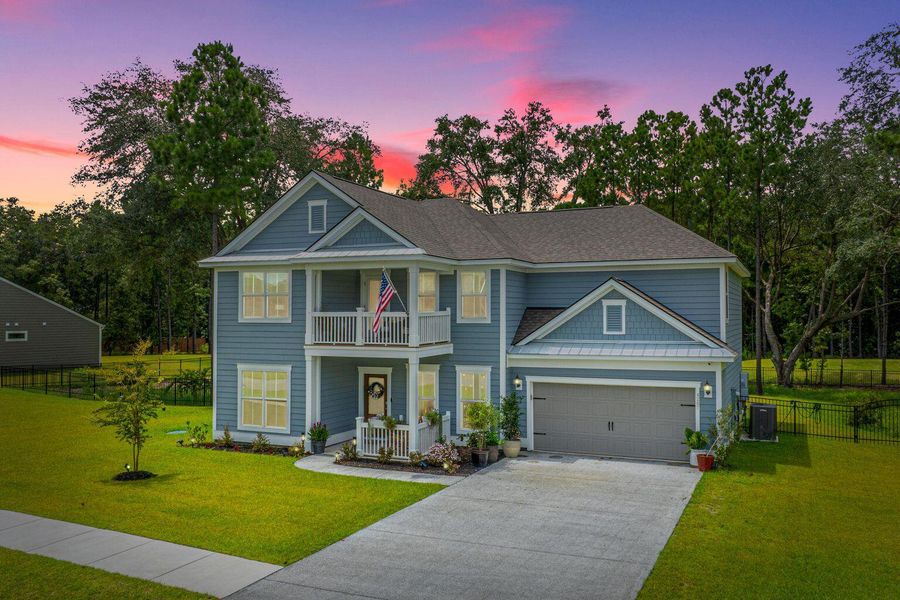 Front exterior of a new home in Sea Island Preserve, Johns Island, SC, highlighting curb appeal (Image 1). Front exterior of a new home in Sea Island Preserve, Johns Island, SC, highlighting curb appeal (Image 1).