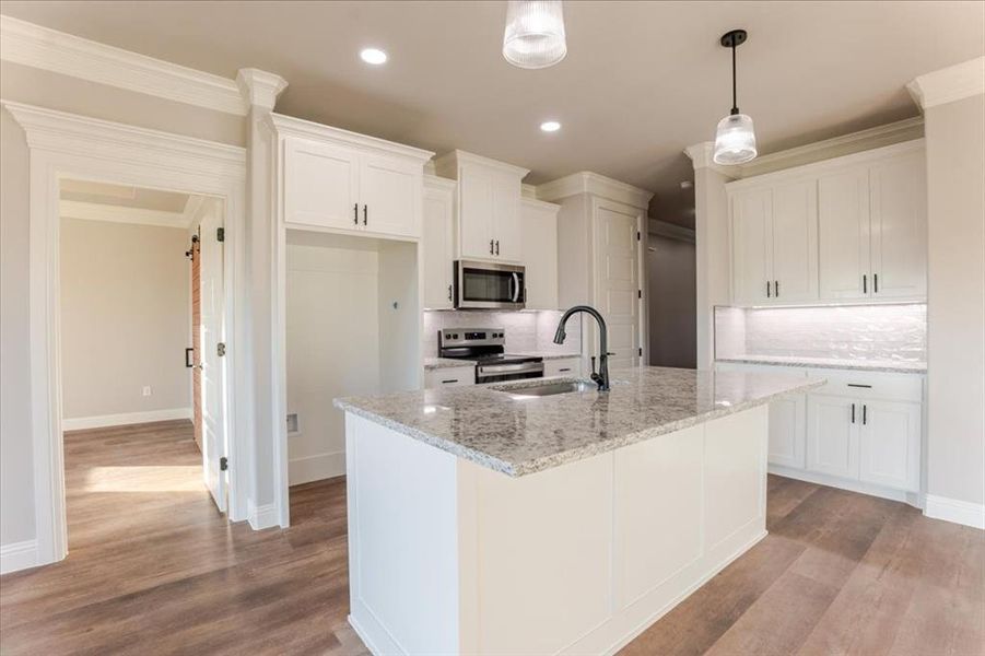 Furnished interior view inside a new home in , Tolar (Image 8).