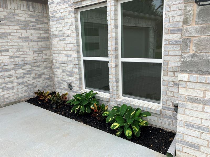 Exterior details and patio area of a home in , Whitney (Image 9).
