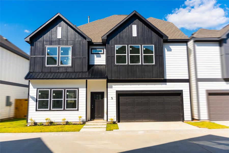 Front exterior of a new home in Metro Village, Houston, TX, highlighting curb appeal (Image 1). Front exterior of a new home in Metro Village, Houston, TX, highlighting curb appeal (Image 1).