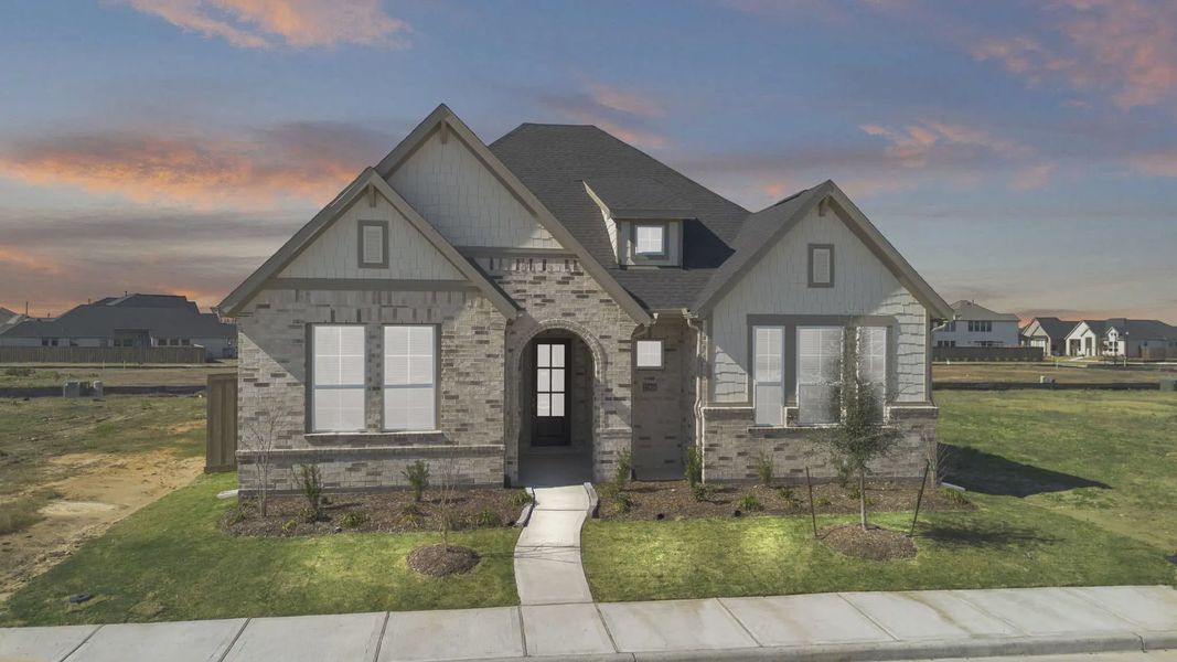 Representative exterior photo of a completed home built from the Nicklaus by Chesmar Homes in Riceland Alley Loads, Mont Belvieu, TX (Image 32).