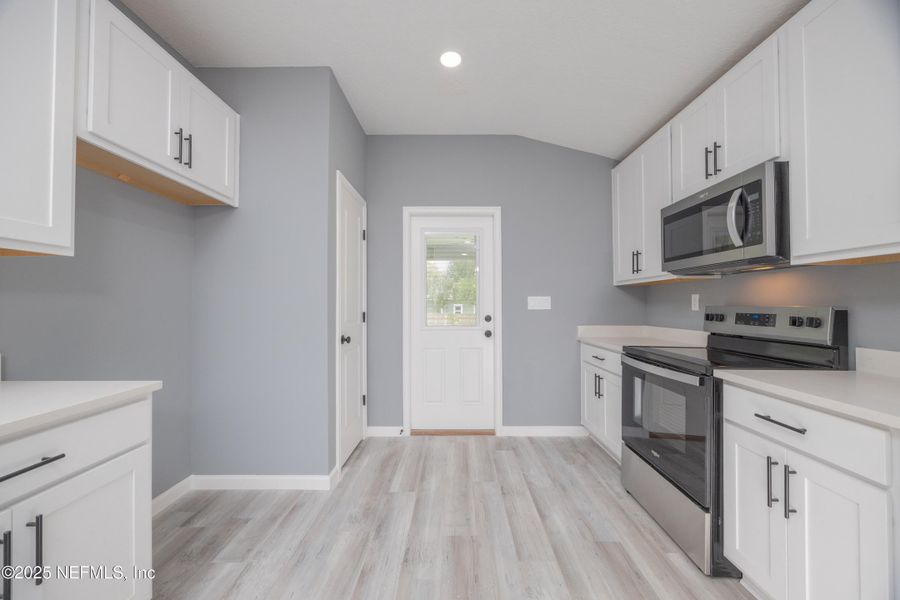 Furnished interior view inside a new home in , St. Augustine (Image 13).