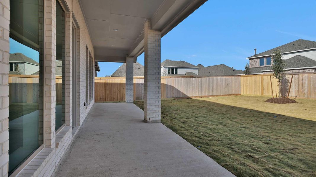 Exterior details and patio area of a home in Bridgeland, Cypress (Image 3).