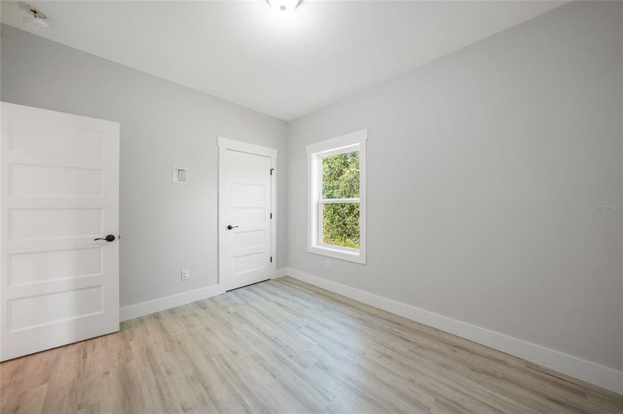 Spacious, unfurnished interior of a new home in , Port Charlotte (Image 24).