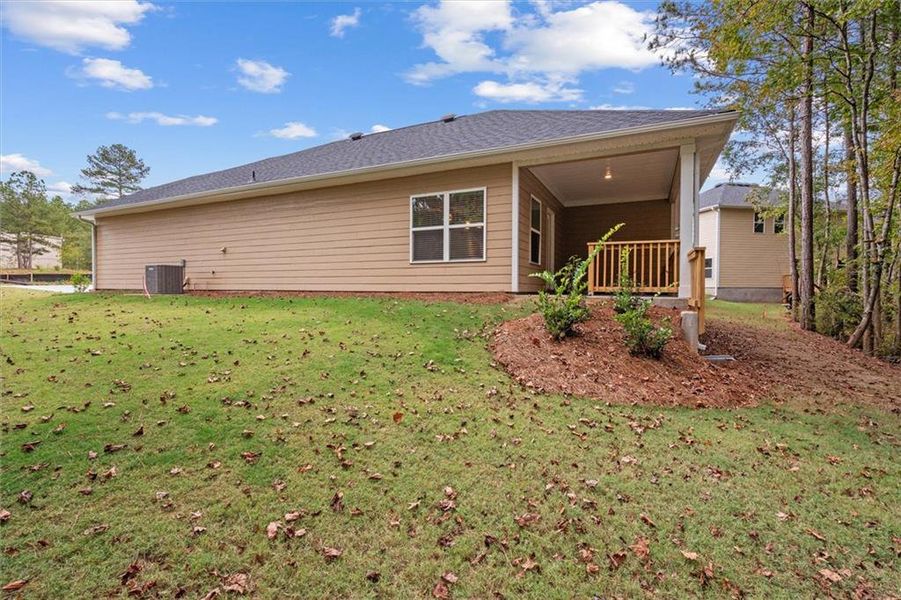 Exterior details and patio area of a home in Canterbury Villas, Carrollton (Image 17).