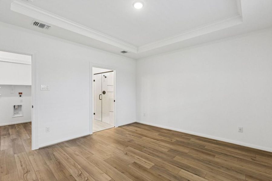 Spacious, unfurnished interior of a new home in Del Webb in Chambers Creek, Willis (Image 21).