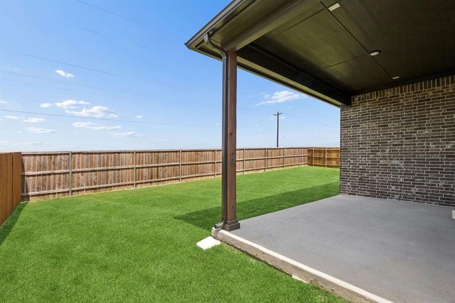 Exterior details and patio area of a home in Country Lakes, Denton (Image 3). Exterior details and patio area of a home in Country Lakes, Denton (Image 3).