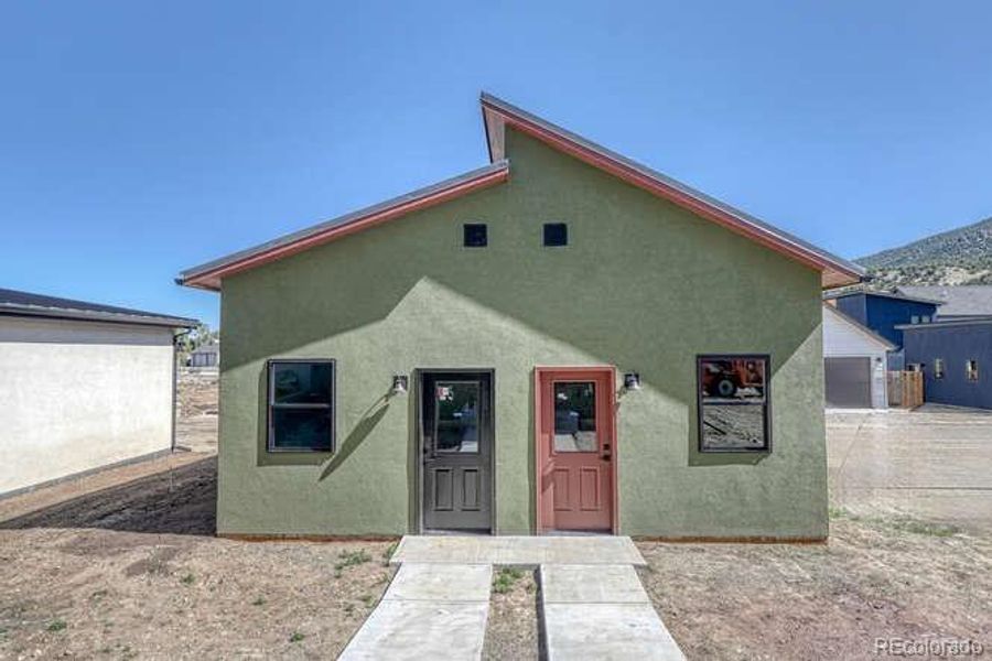 Front exterior of a new home in , Salida, CO, highlighting curb appeal (Image 16). Front exterior of a new home in , Salida, CO, highlighting curb appeal (Image 16).