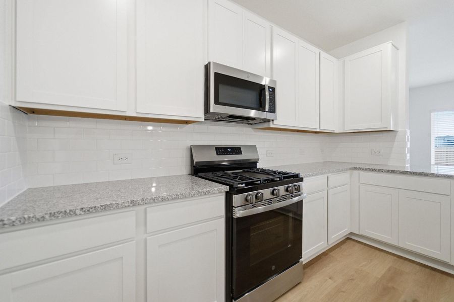 Furnished interior view inside a new home in , Conroe (Image 8).