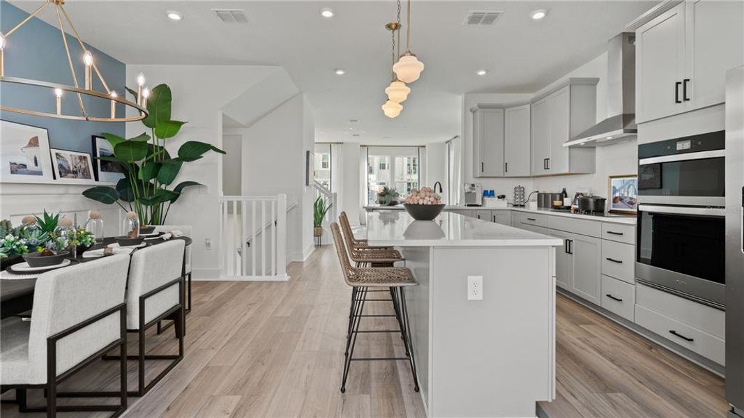 Furnished interior view inside a new home in Parkview at Hamlin, Winter Garden (Image 9).