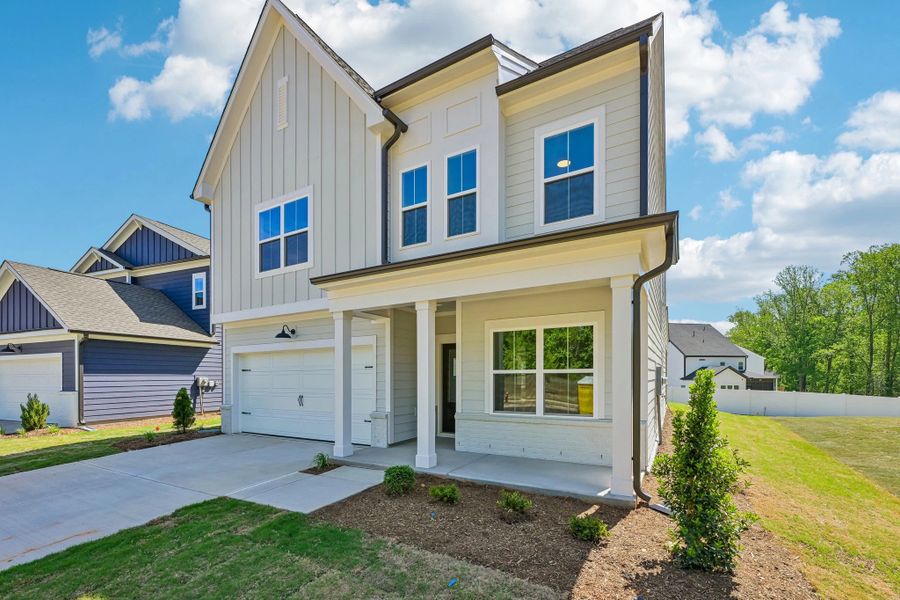 Front exterior of a new home in Rowland's Grant, Fuquay Varina, NC, highlighting curb appeal (Image 16).
