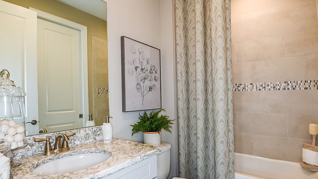 Furnished interior view inside a new home in Esplanade at Azario Lakewood Ranch, Bradenton (Image 18).